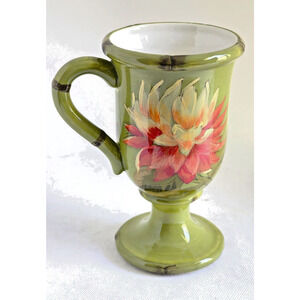 MUG WITH PEDESTAL FOOT-RAYMOND WAITES-Green-Orange Yellow Flower-Holds 12 oz